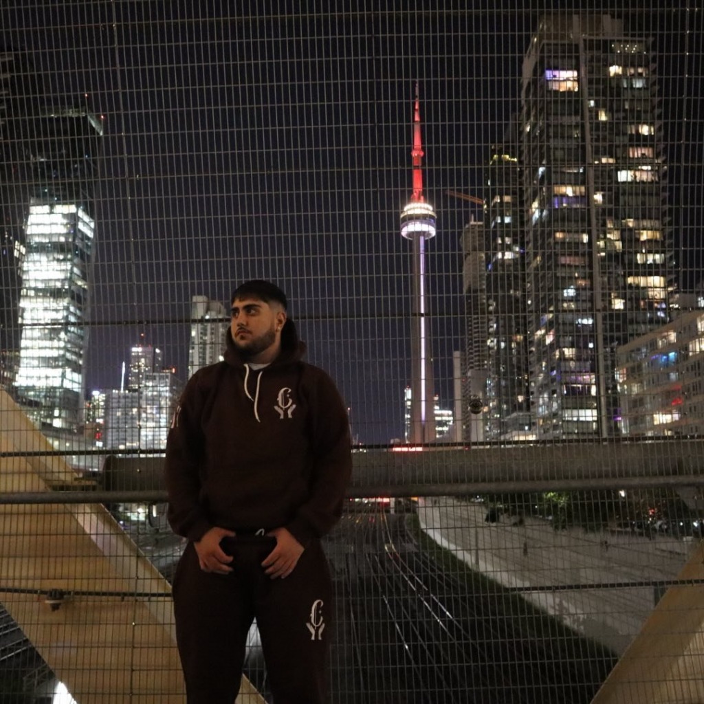 Aren Dayian in Toronto with the CN Tower in the background