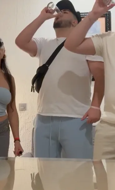Aren Dayian drinking at a party